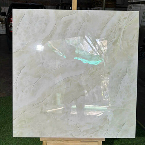 Đá đồng chất Trung Quốc 100×100 xám kem nhũ bạc
